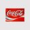 Coca-Cola-Logo von 2002 in weißer Spencerian-Schrift mit „Classic“-Schriftzug auf rotem Hintergrund mit dynamischen Wellen.