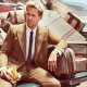 leganter Mann mit gestreiftem Anzug auf Pick-up, umgeben von Gucci-Taschen, ein starkes Beispiel für Luxusmarkenführung.