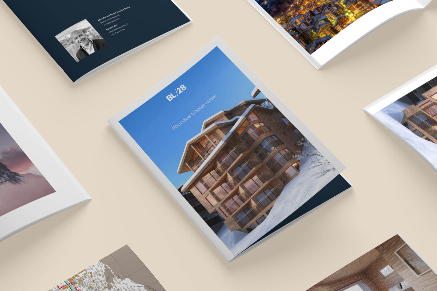 Detailansicht der BL28-Broschüre mit Hotel-Cover, Innenansichten, Matterhorn-Bild und Projektübersicht, elegant präsentiert.